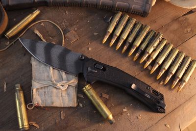 Zero Tolerance 0203 4" Duralock Folder / Black G-10 / Tiger Striped M4 ( Pre owned )