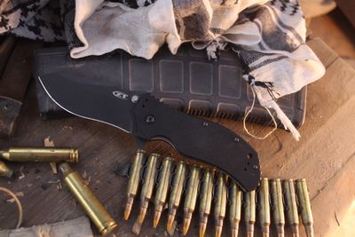 Zero Tolerance 0350 Ken Onion 3.25" Assisted Linerlock Flipper / Black G-10 / Black S30V ( Pre Owned )