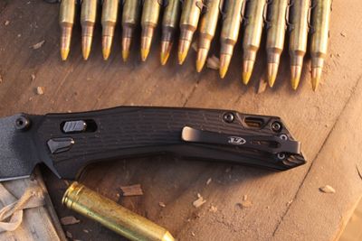 Zero Tolerance 0203 4" Duralock Folder / Black G-10 / Tiger Striped M4 ( Pre Owned )