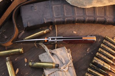 Benchmade Bugout 3.24" AXIS Lock Folder / Aluminum &amp; Redstone Richlite / Stonewashed S90V ( Pre Owned )