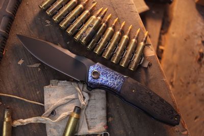 WE Knife Co Archeozoic 4" Interframe Lock Flipper / Flamed Titanium &amp; Rose Carbon Fiber / Black M390 ( Pre Owned )