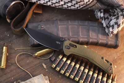 Zero Tolerance 0203 4" Duralock Folder / OD Green G-10 / Black M4 ( Pre Owned )