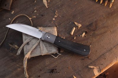 Pena X Series Swayback 2.867" Front Flipper / Black Burlap Micarta & Titanium / Satin M390 ( Pre Owned )