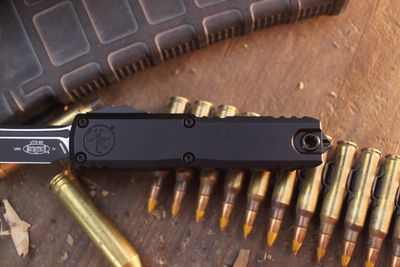 Microtech UTX-85 GEN IV T/E 3" OTF Auto / Black Machined Aluminum / Black M390MK