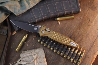 Microtech Socom Elite 4" RAM-LOK Folder / Tan Frag Aluminum / Black M390MK