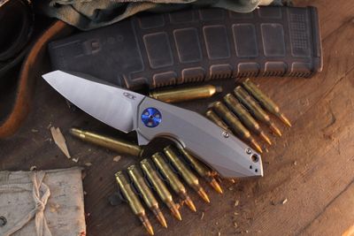 Zero Tolerance 0456 Sinkevich 3.25" Framelock Flipper / TItanium / Satin CTS-204P ( Pre Owned )