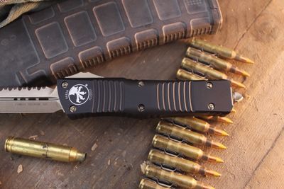 Microtech Combat Troodon D/E 3.8" OTF Auto / Black Aluminum / Bronze Serrated ( Pre Owned )