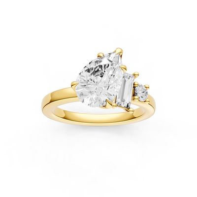14KY Asymmetrical 1.5ct Pear Center with Baguette and Round Diamonds .34ct Semi-Mount