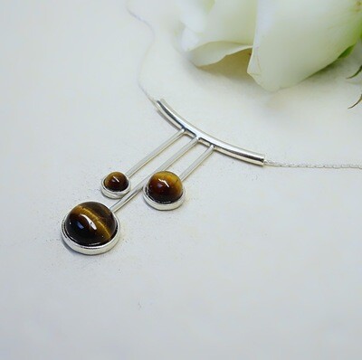 Shiny silver pendant - Tiger Eye stones Shiny silver pendant - Tiger Eye stones