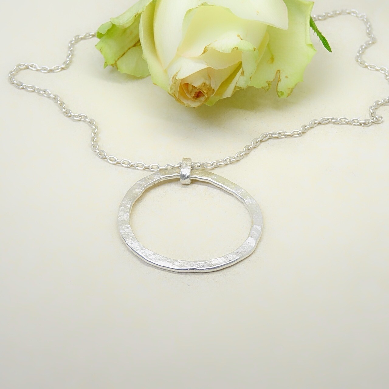 Silver pendant - Hammered stone pattern