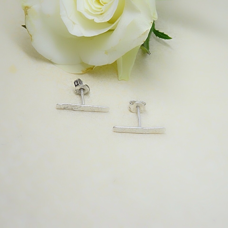 Silver ear studs