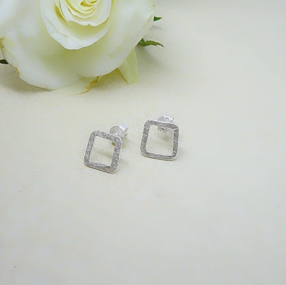 Silver ear studs