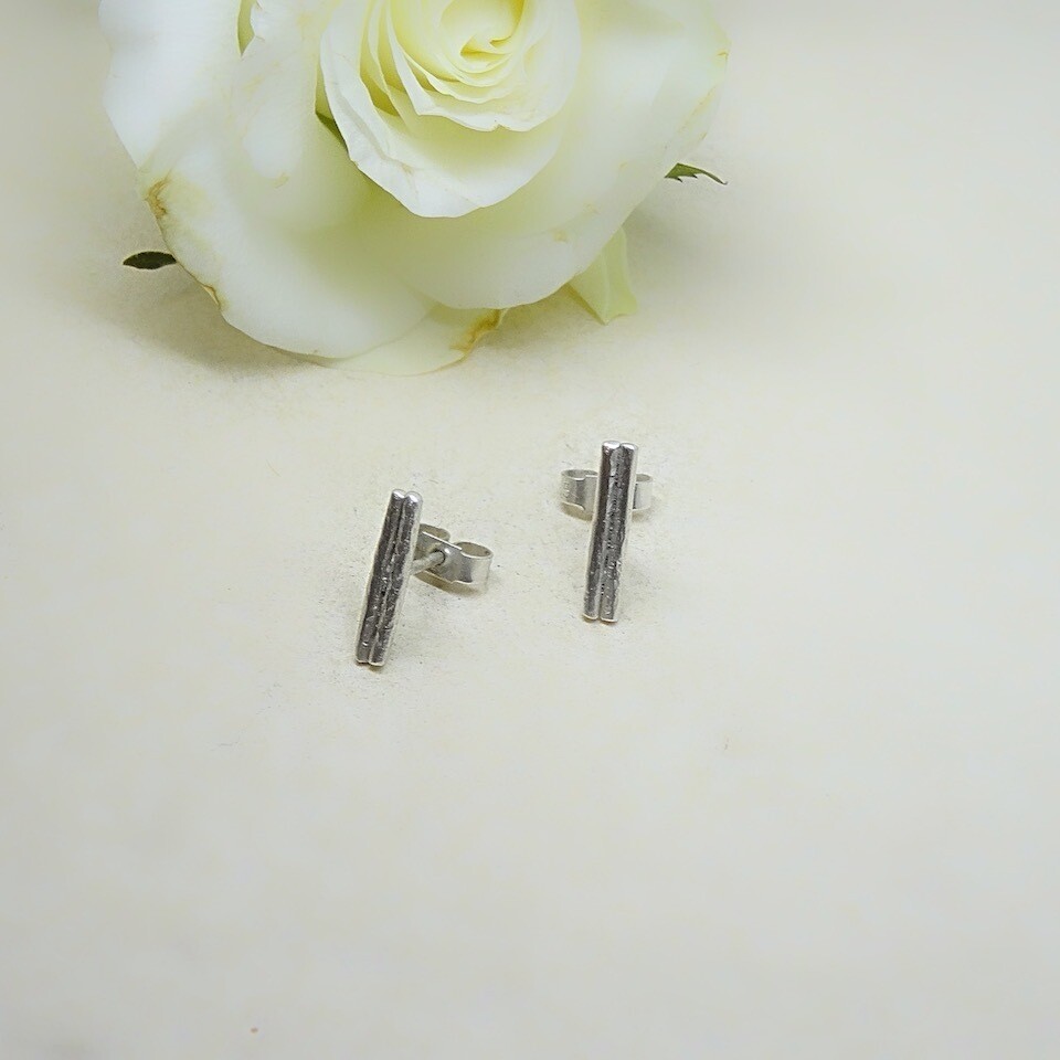 Silver ear studs