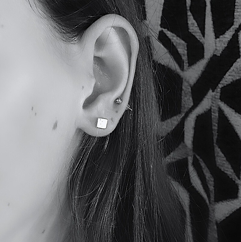 Silver ear studs