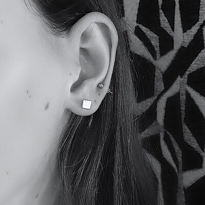 Silver ear studs
