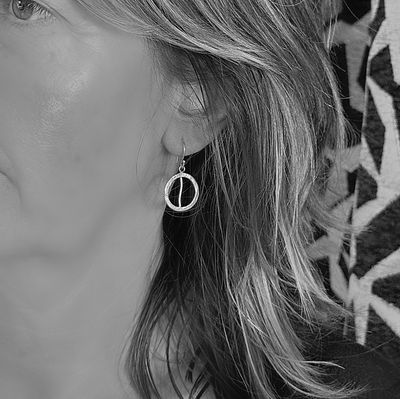 Gold plated silver circle earrings with wavy detail
