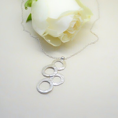 Silver pendant - Hammered stone pattern