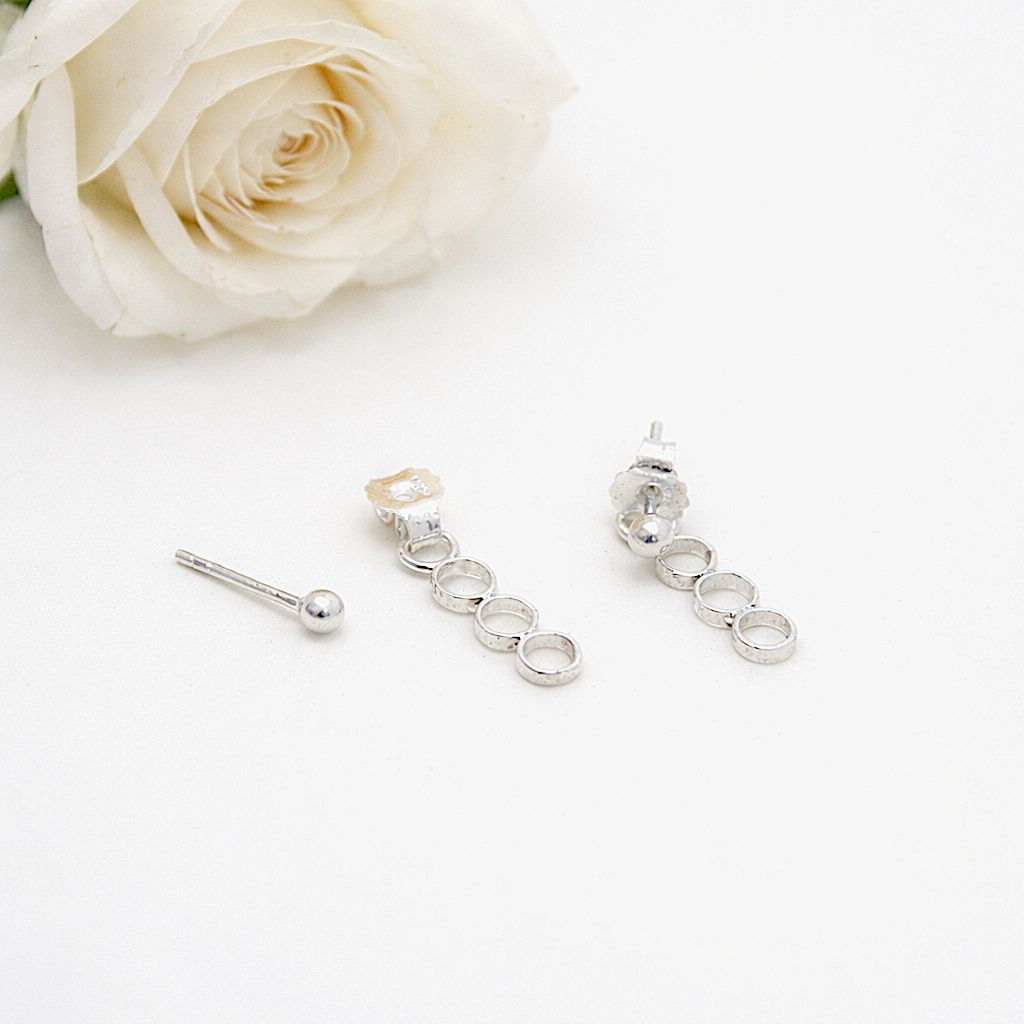 Silver ear studs