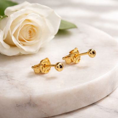 Gold-plated silver stud earrings with small ball