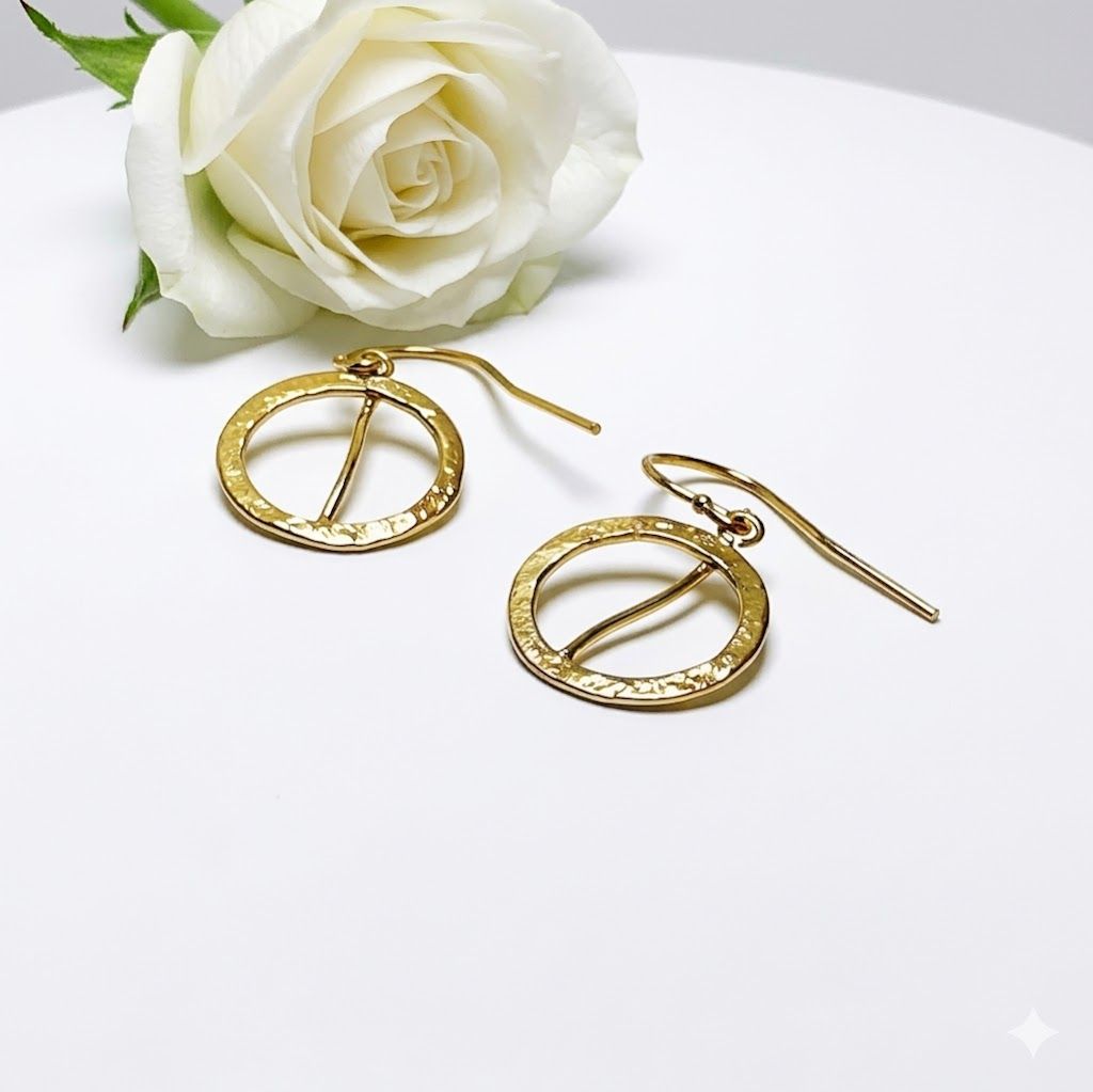 Gold plated silver circle earrings with wavy detail