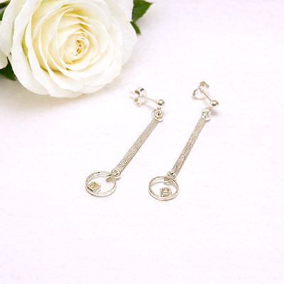 Silver stud earrings with bar circles and squares