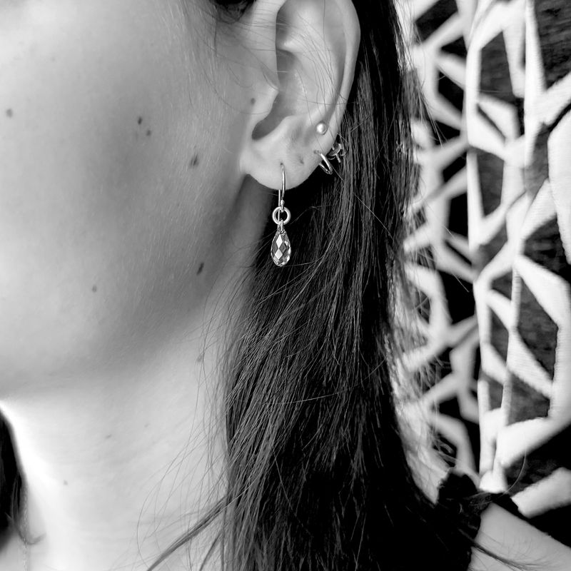 Playful gold-plated earrings with shiny Swarovski stones