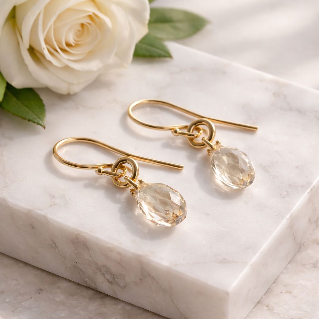 Playful gold-plated earrings with shiny Swarovski stones