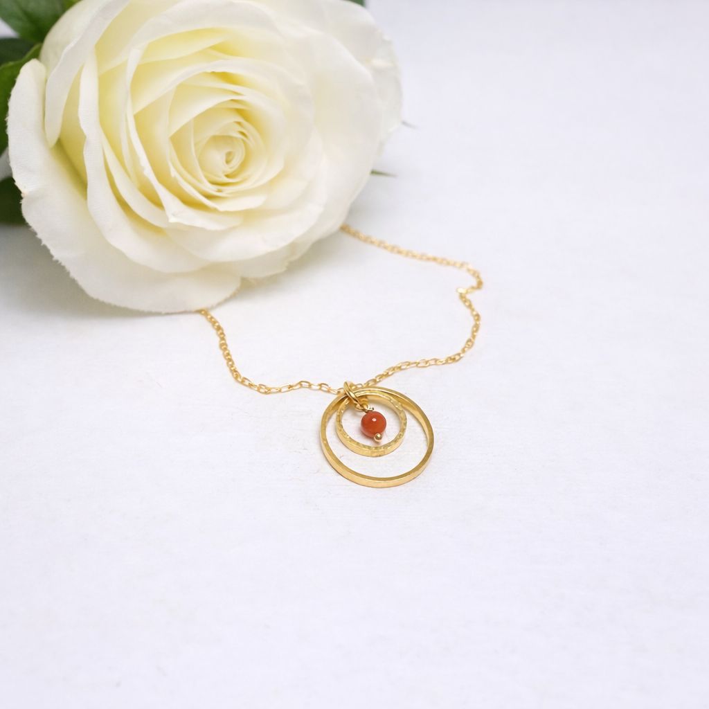 Gold-plated silver pendant with two circles and natural pearl