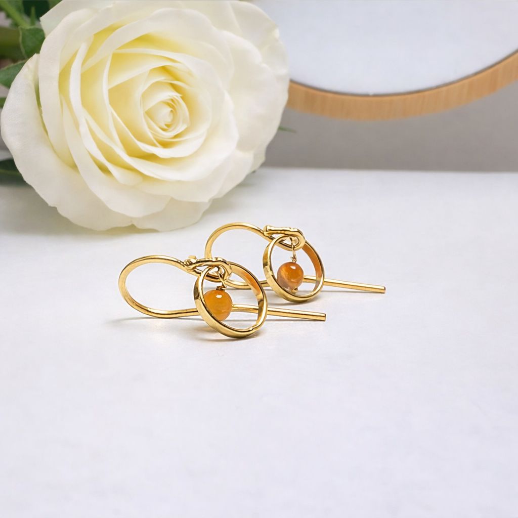 Playful gold-plated earrings with natural stones