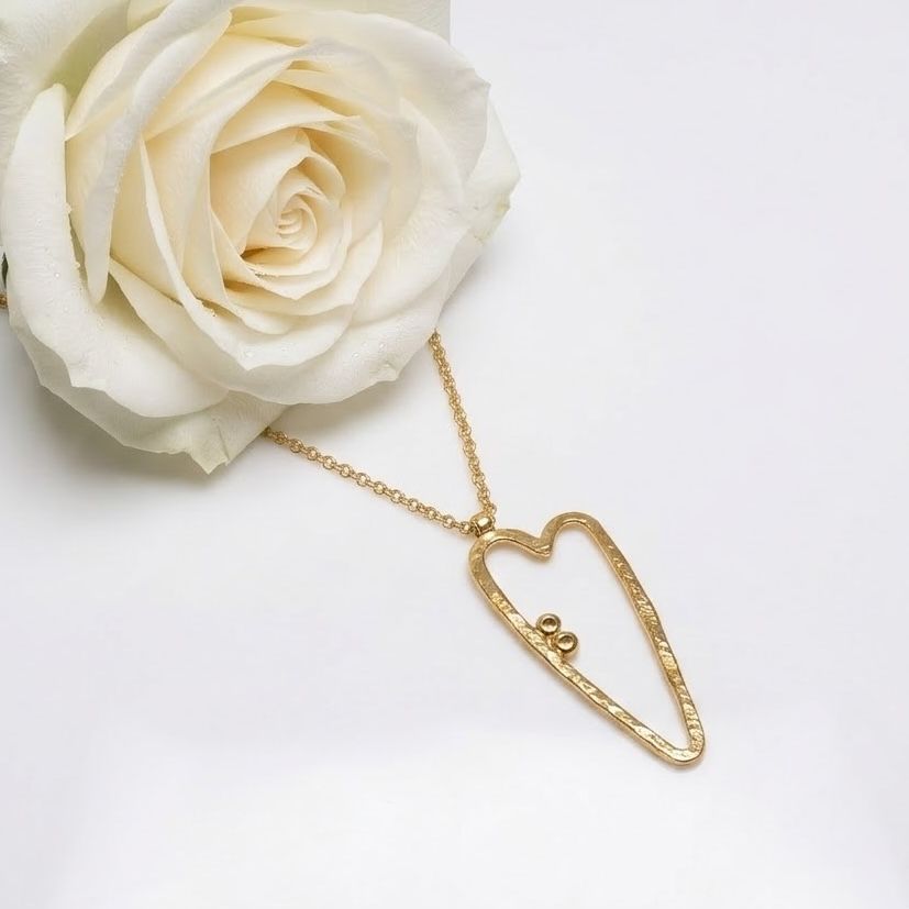 Silver heart-shaped pendant - original - unique - handmade