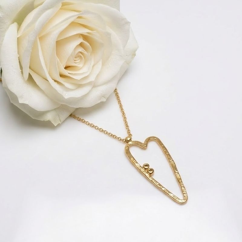 Silver heart-shaped pendant - original - unique - handmade