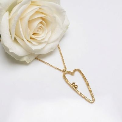 Silver heart-shaped pendant - original - unique - handmade