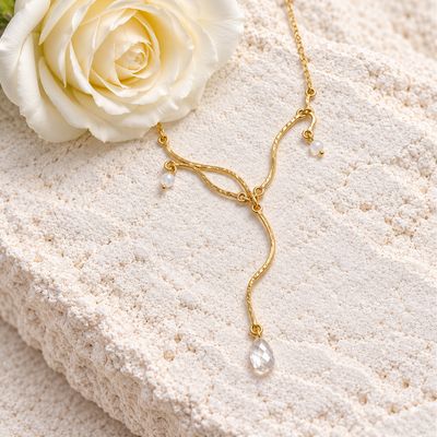 Beautiful long necklace with the waves of nature. Handmade in silver with an 18k gold plating.