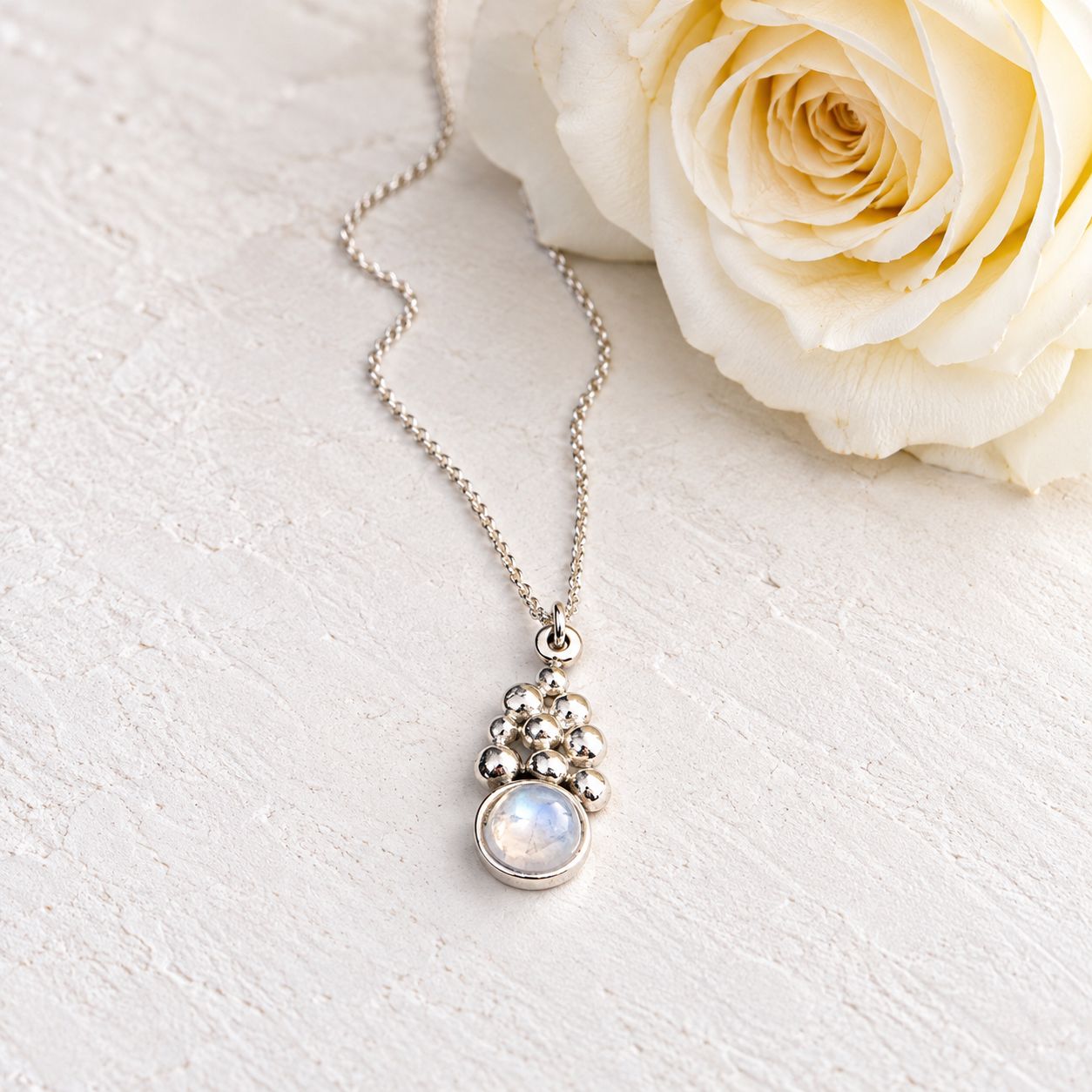 Small pendant with beads and moonstone