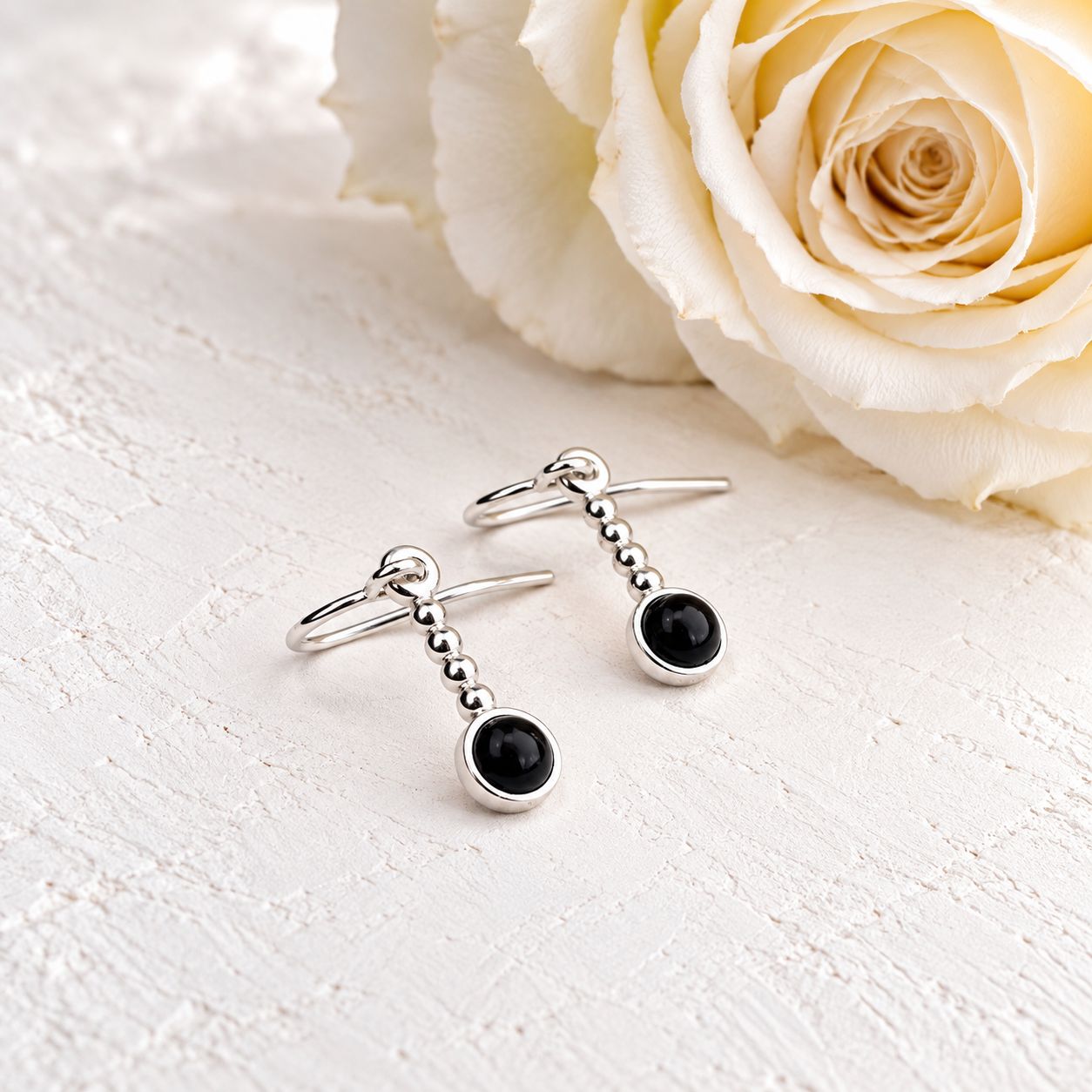 Small drop earrings with tiny spheres and black onyx stones