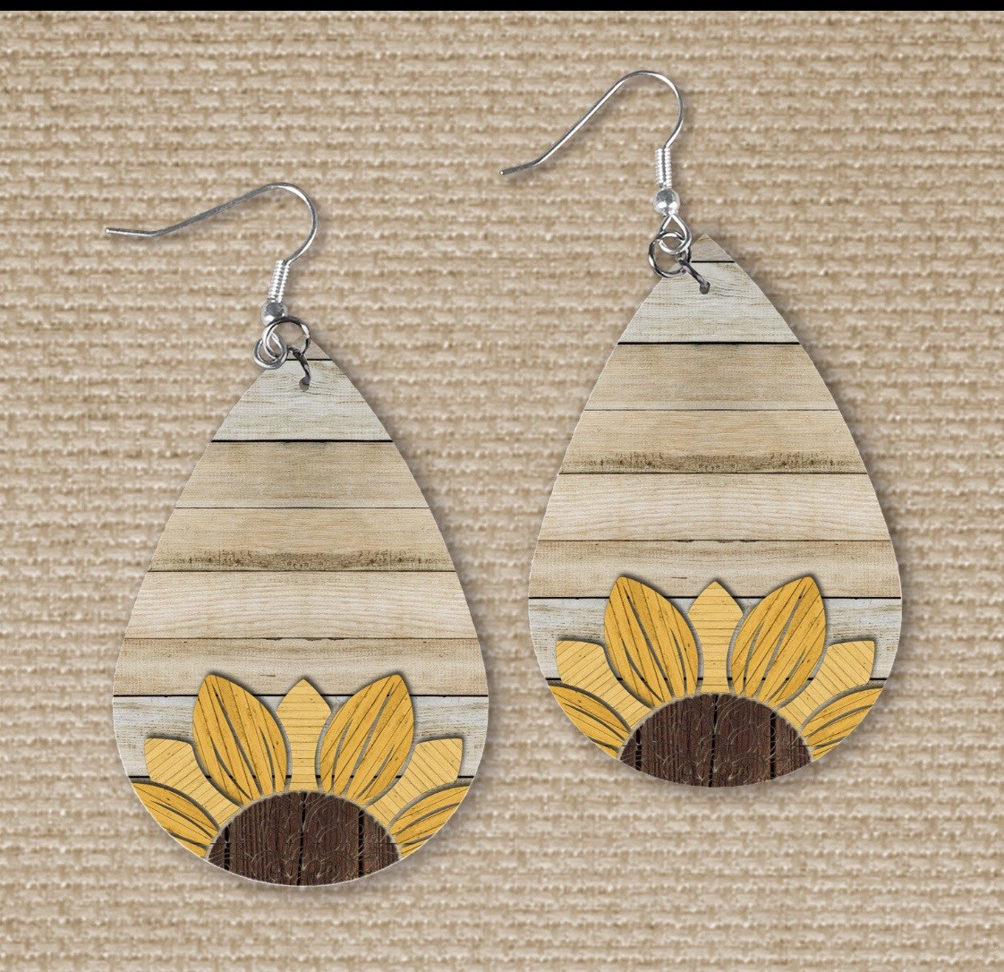 Beautiful Sunflower Earrings With Shiplap Background