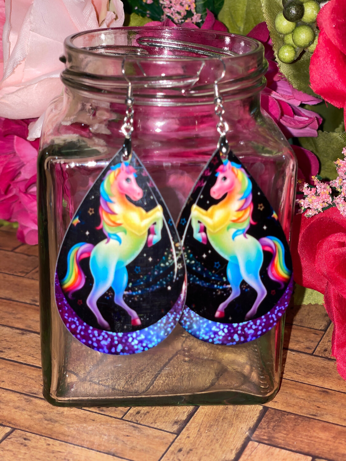 Rainbow Unicorn Earrings with Faux glitter around bottom edges.
