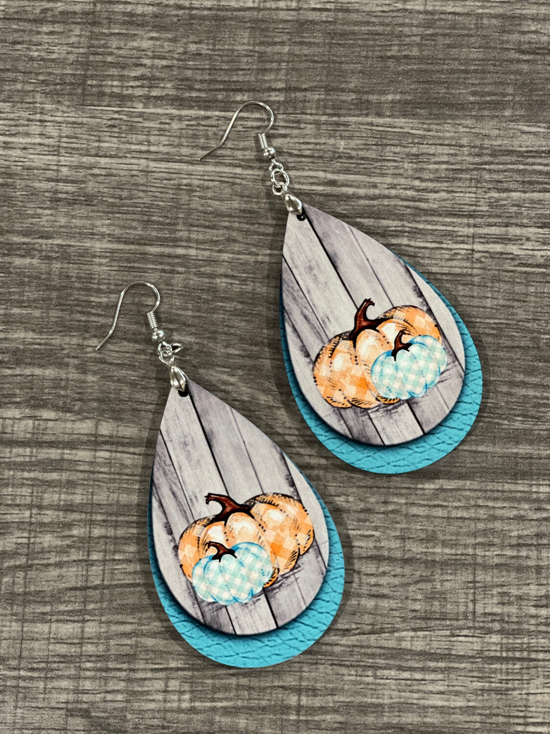 Fall Pumpkins With Teal Background