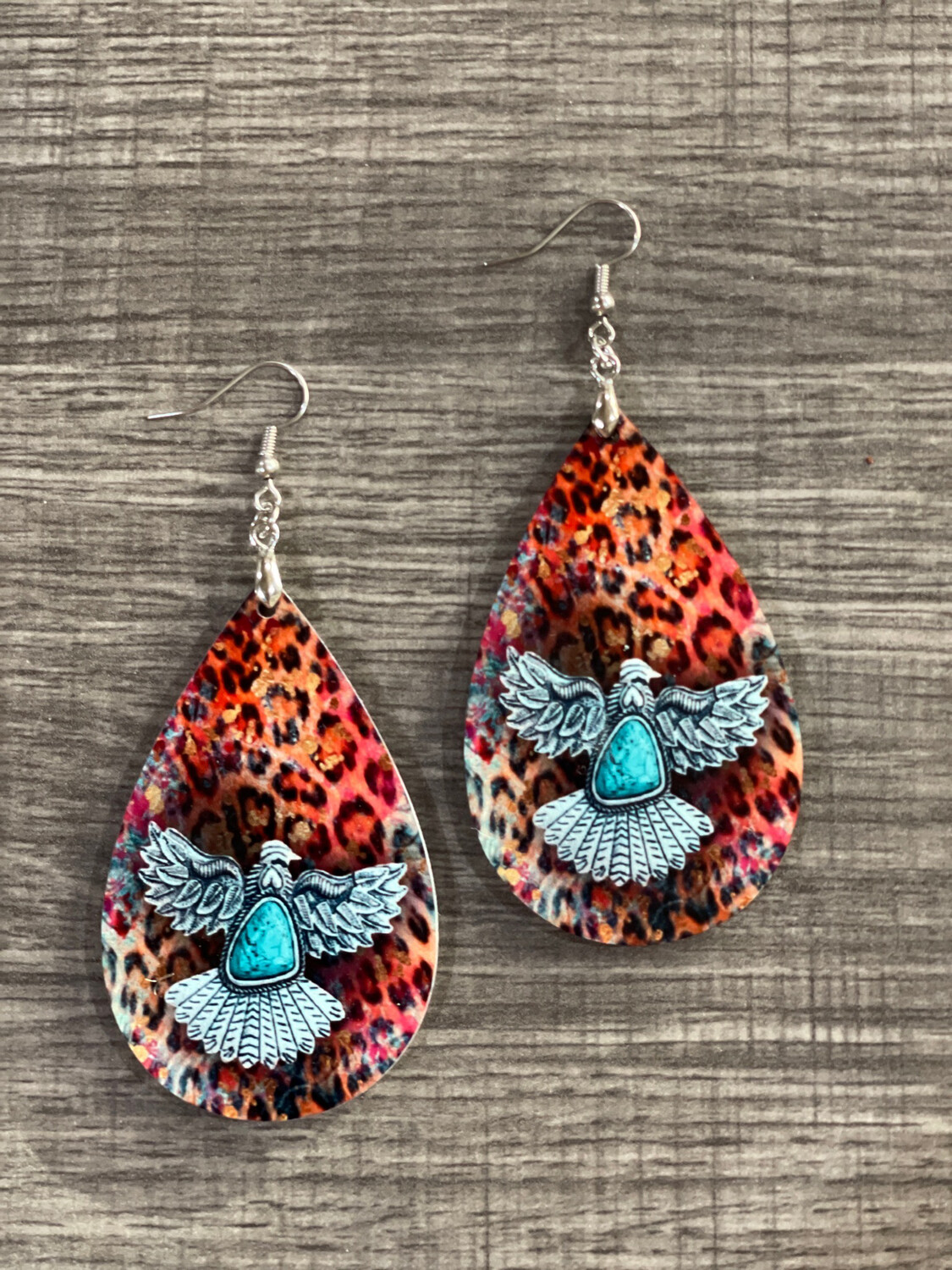 Faux turquoise Eagle With Cheetah Background Teardrop Earrings.
