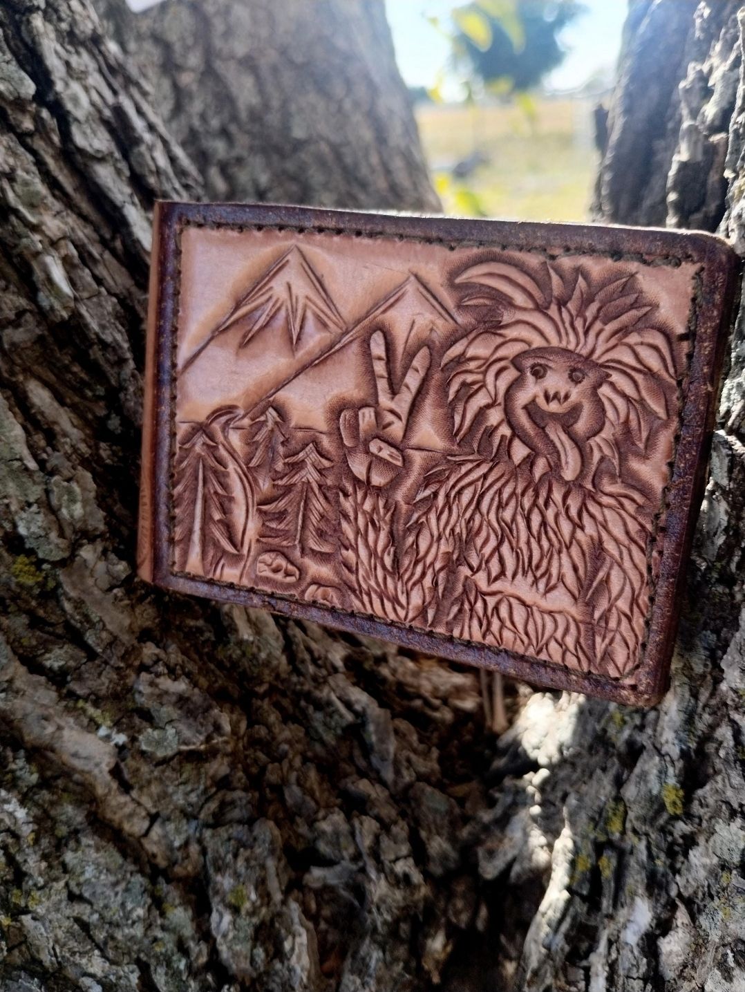 Bigfoot tooled leather bifold wallet Bigfoot tooled leather bifold wallet