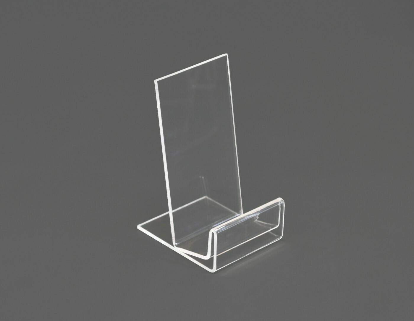 This mobile phone stand is made from one sheet of acrylic.