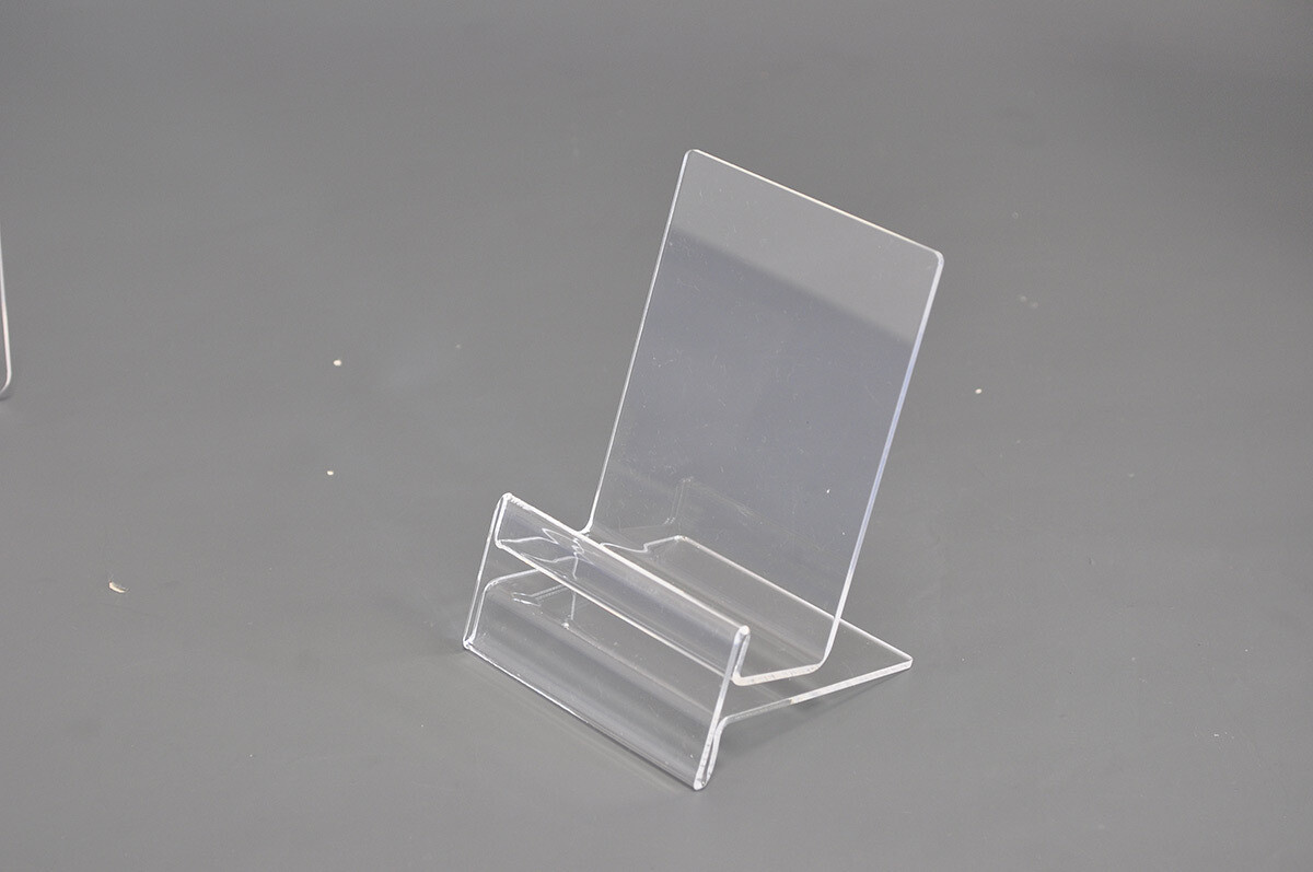 This stand for the mobile phone is made of one sheet of acrylic.