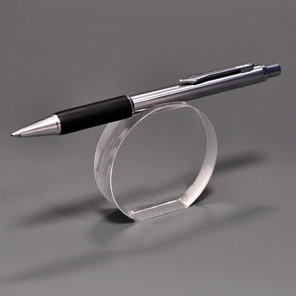 Round pen stand with flattened base.