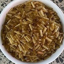 Transparent bugle bead, Amber