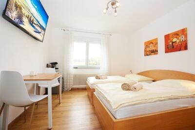 Double room in Villach with a view of the countryside