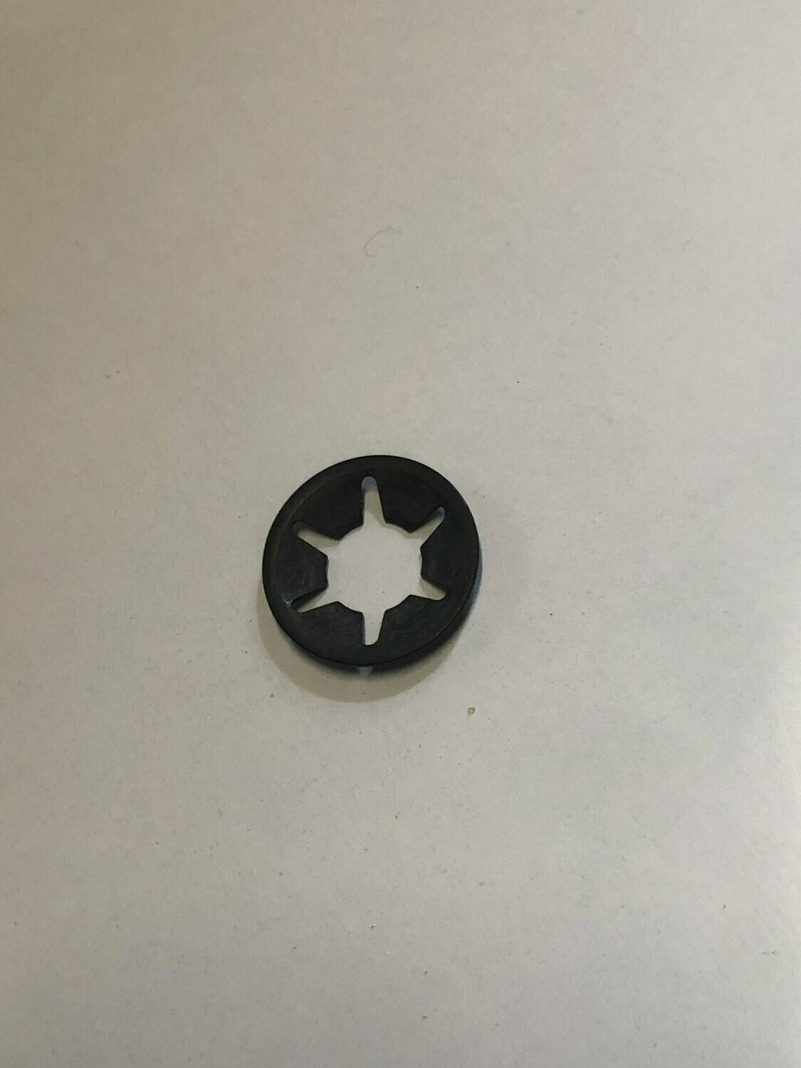 Retainer for photocell tube