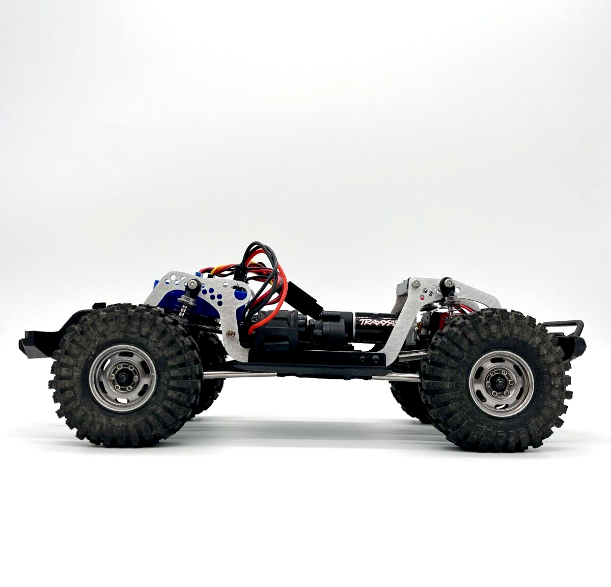 Orange Crawler &quot;WEDGE&quot; TRX4M Low CG Chassis. Lay Down Servo Compatible. Sliders Included.
