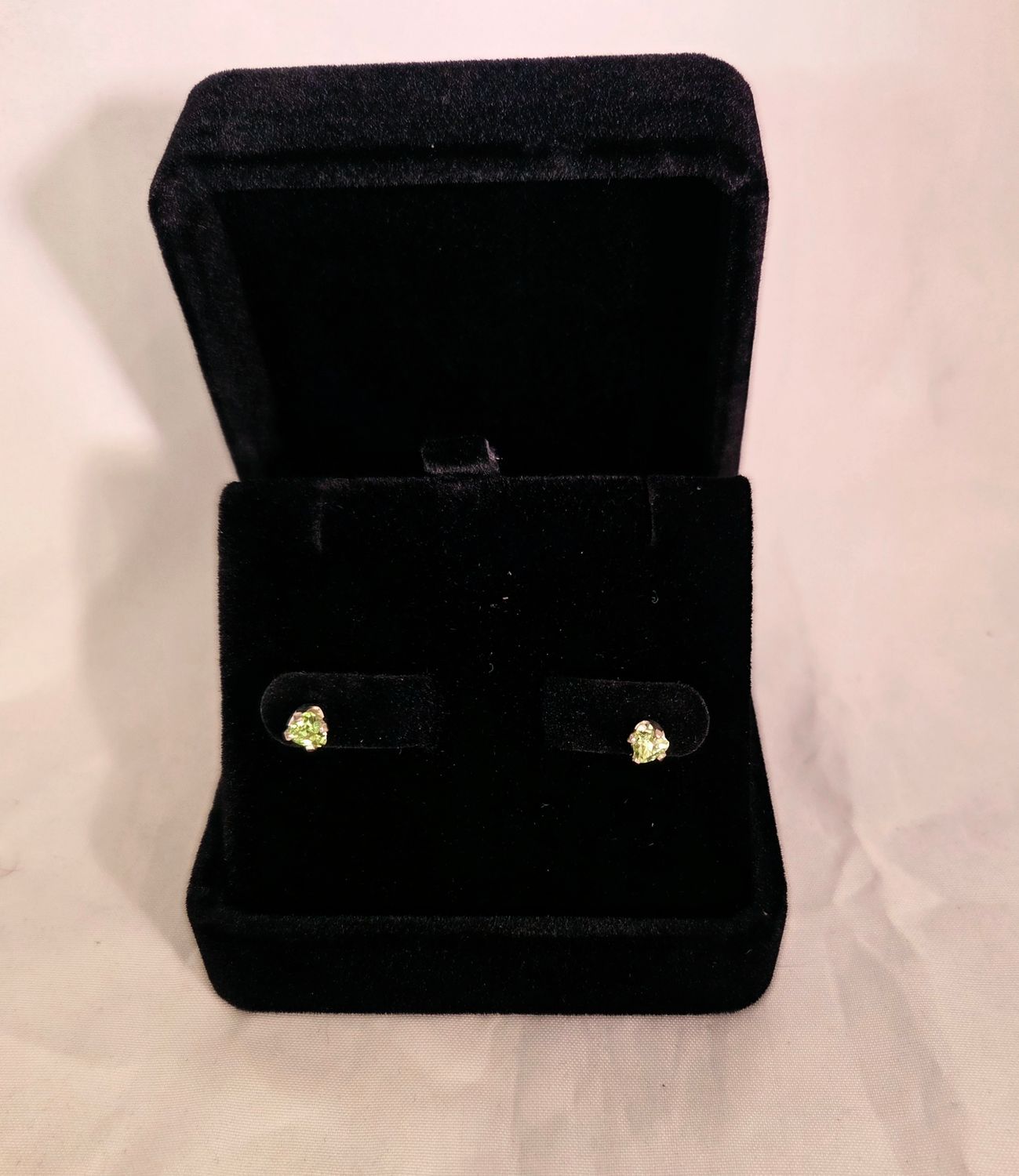 Natural Peridot 4mm Round set in Sterling Silver Stud Earrings
