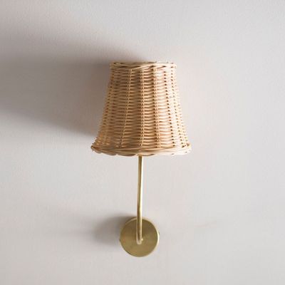 CECILLY RATTAN AND BRASS WALL LIGHT
