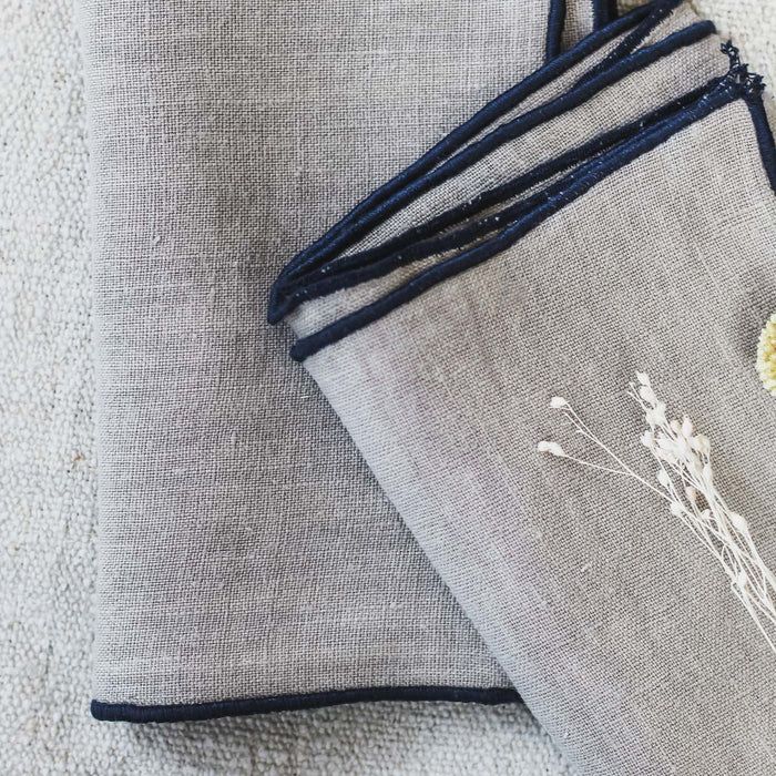 NAVY PIPED LINEN NAPKIN